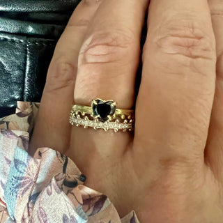 Karen Karch Jaipur Swing 18kw Diamond Half Eternity Ring with Ball details on both sides of band on hand stacked with 18ky Jaipur Sway Heart Solitaire Black Daiamond.