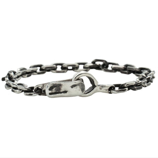 Karen Karch Hooked Silver 5mm Diamond Cut Cable chain bracelet with Handmade Weathered Spring Hook Clasp on a white background.