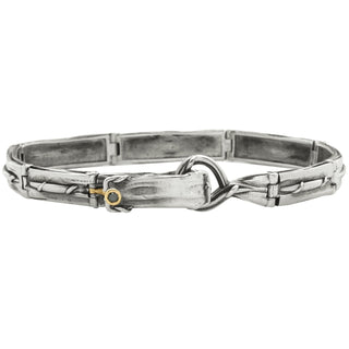 Karen Karch Silver Vine Tattoo Maintay bracelet with spring hook clasp with a gold safety latch set with a black diamond on a white background