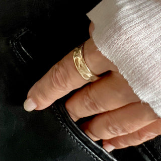 Karen Karch Everpresent Weathered Irregular edge 14k yellow gold 7.5 mm band on hand.