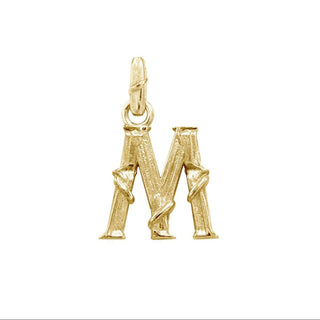 Karen Karch textured 18k yellow gold charm in the shape of the letter 'M' with a vine-detail and rectangular bail on white background.