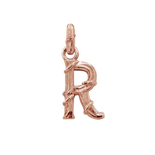Karen Karch textured 18k rose gold charm in the shape of the letter 'R' with a vine-detail and rectangular bail on white background.