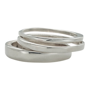 Karen Karch smooth irregular polished Always 3-ring stack on a white background.
