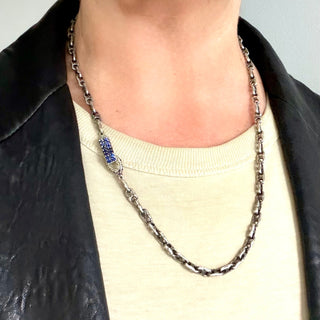Karen Karch Silver Blue Sapphire Studded Clasp on handmade 2-hole weathered link chain on a neck.