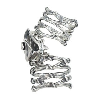 Karen Karch Gabrielle Rose silver knuckle ring with a rosebud that sits over the knuckle that connects to two Gladiator Vine Bands extending the length of the finger, side view, on white background.
