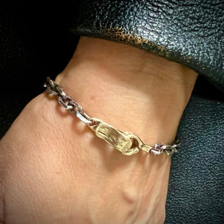 Karen Karch Silver Chain Bracelet with weathered gold spring hook clasp on the wrist.