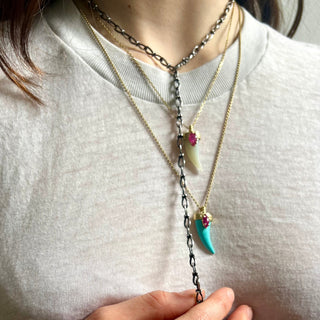 Karen Karch Layered Draped Lucky Horn Amulet 18k Yellow Gold Ruby Turquoise Moonstone Amulet styled on Person