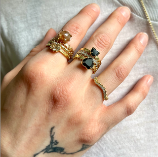 Karen Karch Jaipur Collecton 18ky, 18kw, 18kr diamond rings styled on hand.