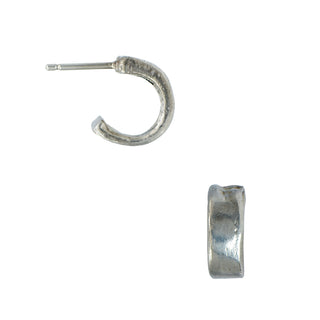 Karen Karch pair of weathered silver Mainstay hoop earrings, with one hoop displayed upright and the other on its side, against a white background.