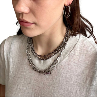 Karen Karch Double Vine Earring on model with handmade silver chains layered on neck