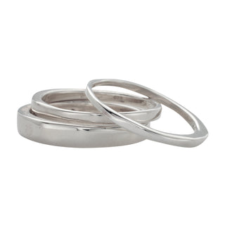 Karen Karch smooth irregular polished Always 3-ring stack on a white background.