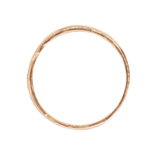 Karen Karch Willow Weathered Irregular edge 18k rose gold slender band, top view, on white background.