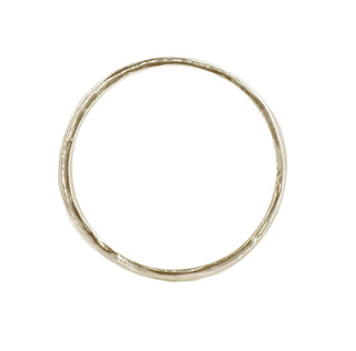 Karen Karch Willow Weathered Irregular edge 18k white gold slender band, top view, on white background.