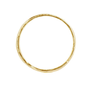 Karen Karch Willow Weathered Irregular edge 18k yellow gold slender band on white background, top view.