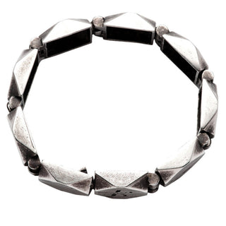 Karen Karch Top View of Silver Outshine 16mm wide bracelet with geometric square faceted corner with logo clasp shown on a white background.