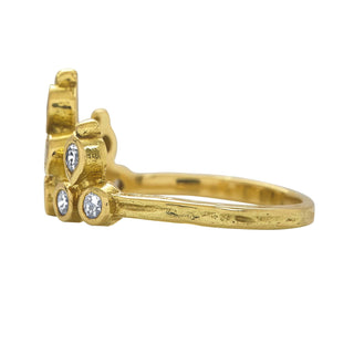 Karen Karch 18k Yellow Gold Belgian Tiara Ring with 10 diamonds clustered in a crown shape, side view on a white background.