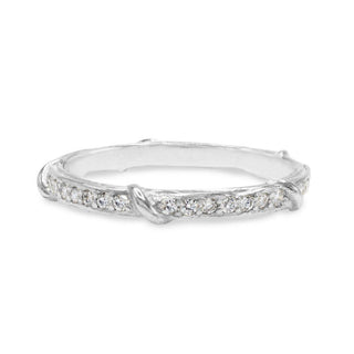 Karen Karch Platinum Colorless Diamond-Studded Eterity Band on White Background.