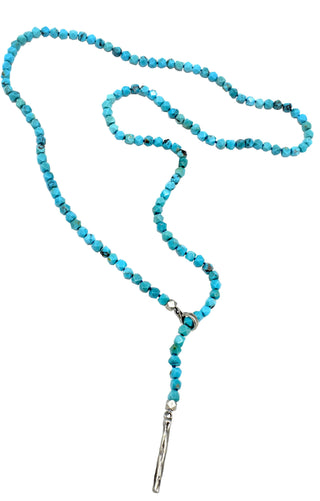 A turquoise lariat necklace with a silver weathered texture loop and a pull-through bar closure, full necklace by Karen Karch