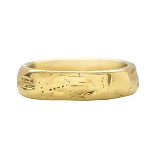 Karen Karch Gold Glimmer domed band on white background.