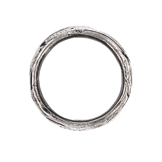 A Karen Karch silver domed weathered band with an irregular rounded edge, top view,  on a white background.