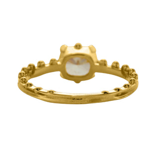 An 18k yellow gold ring by Karen Karch with a cushion-cut champagne diamond set in a four-claw demi-bezel setting, featuring a weathered texture band with ball details, back view, on a white background.