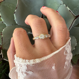 Karen Karch custom 14ky gold weathered asymmetric wrapped half eternity with diamonds on a hand