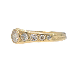 Karen karch 14ky gold weathered asymmetic wrapped half eternity band with diamonds, side view, on a white background