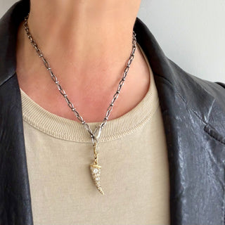 Karen Karch Diamomnd Studded Gold Lucky Horn Amulet on Jaipur Infinite sterling silver handmade chain with figure eight shaped links detailed with 4 balls at the center, worn on the neck.