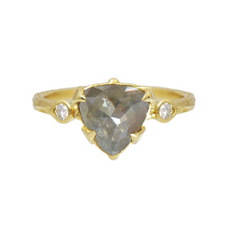 Karen Karch 18k Dark Grey Trilliion Diamond held by 4 claws with a colorless diamond on each side on a weathered gold band.  