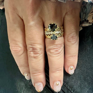 Karen Karch 18ky Jaipur Swing and Sway Black Diamond Heart Solitaires with 18kw colorless diamond Half Eternity centered on hand