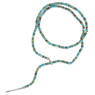 A multi-colored turquoise and silver heishi bead lariat with a weathered texture closure by Karen Karch