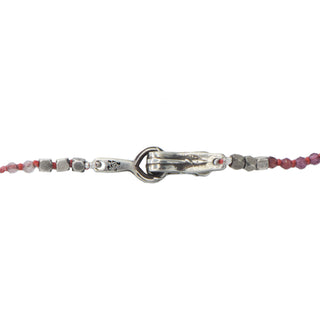 Karen Karch Silver VINE TATTOO HOOKED Clasp close up back side on Bead LITHE necklace in pink to red shaded 2mm faceted round beads on a white 