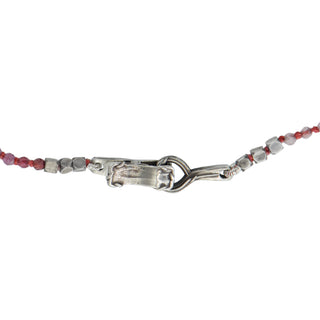 Karen Karch Silver VINE TATTOO HOOKED Clasp close up  on Bead LITHE necklace in pink to red shaded 2mm faceted round beads on a white background. 