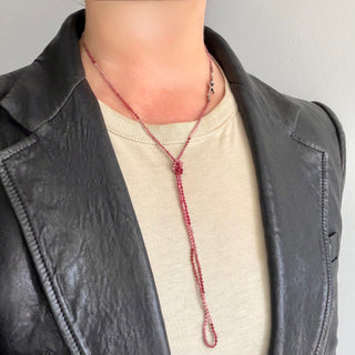 Karen Karch Silver VINE TATTOO HOOKED Clasp Bead LITHE necklace in pink to red shaded 2mm faceted round beads shown knotted around a neck.