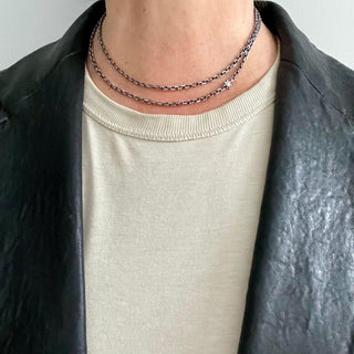 Karen Karch Long Silver Chain necklace with diamond center Star shown Doubled on neck.