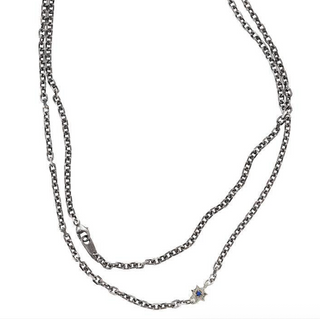 Karen Karch Long Silver Chain necklace with Lapis center Star shown Doubled, close up, on white. 