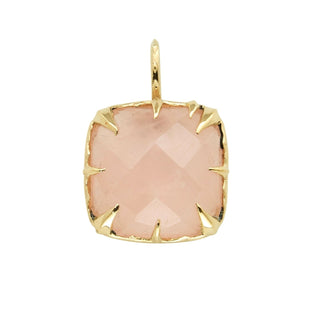 Karen Karch by Deme Wolfe Pink rose quartz pendant with gold frame with sharp claws on a white background