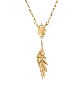 A gold-filled chain necklace with a 10ky skull design at the center and a wing charm by Deme Wolfe for Karen Karch.