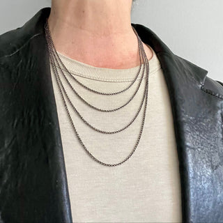 Karen Karch Sterling Silver 1.9mm cable chain in various lengths on a neck