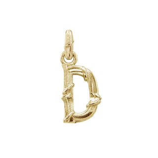 Karen Karch textured 10k yellow gold charm in the shape of the letter 'D' with a vine-detail and rectangular bail on white background.