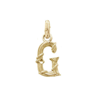Karen Karch textured 10k yellow gold charm in the shape of the letter 'G' with a vine-detail and rectangular bail on white background.
