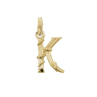 Karen Karch textured 10k yellow gold charm in the shape of the letter 'K' with a vine-detail and rectangular bail on white background.