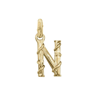 Karen Karch textured 10k yellow gold charm in the shape of the letter 'N' with a vine-detail and rectangular bail on white background.