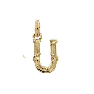 Karen Karch textured 10k yellow gold charm in the shape of the letter 'U' with a vine-detail and rectangular bail on white background.