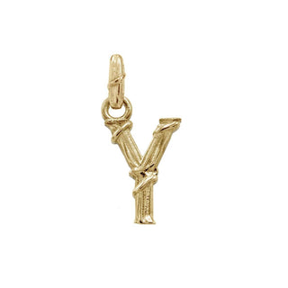 Karen Karch textured 10k yellow gold charm in the shape of the letter 'Y' with a vine-detail and rectangular bail on white background.