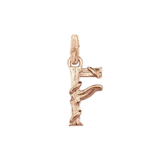 Karen Karch textured 10k rose gold charm in the shape of the letter 'F' with a vine-detail and rectangular bail on white background.