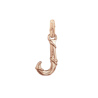 Karen Karch textured 10k rose gold charm in the shape of the letter 'J' with a vine-detail and rectangular bail on white background.