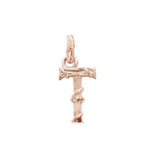 Karen Karch textured 10k rose gold charm in the shape of the letter 'T' with a vine-detail and rectangular bail on white background.