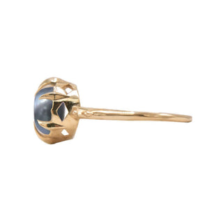 Karen Karch by Deme Wolfe Black Pearl 10k yellow gold Solitaire Ring with Sharp claws, side view,  on white background. 