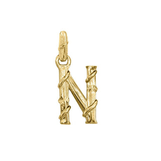 Karen Karch textured 18k yellow gold charm in the shape of the letter 'N' with a vine-detail and rectangular bail on white background.